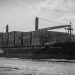 Black and white photo of a container ship in Istanbul, Turkey.